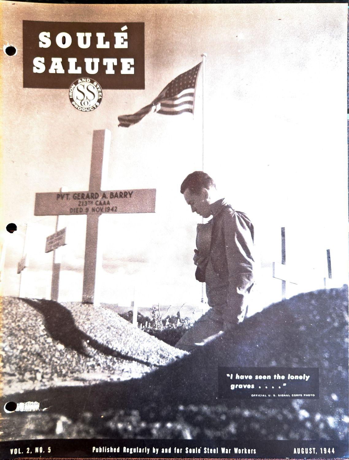 Soldier saluting a grave with a cross and American flag.