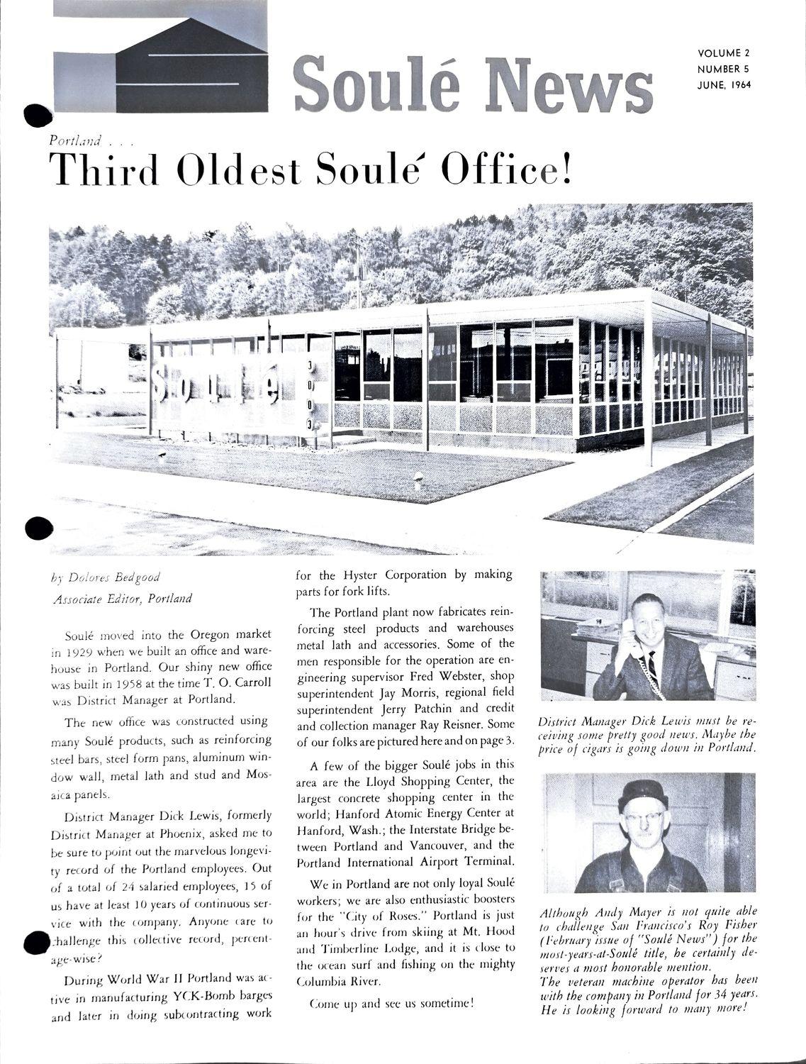 Black and white photo of a long, single-story office building with a large Soule sign on the side.