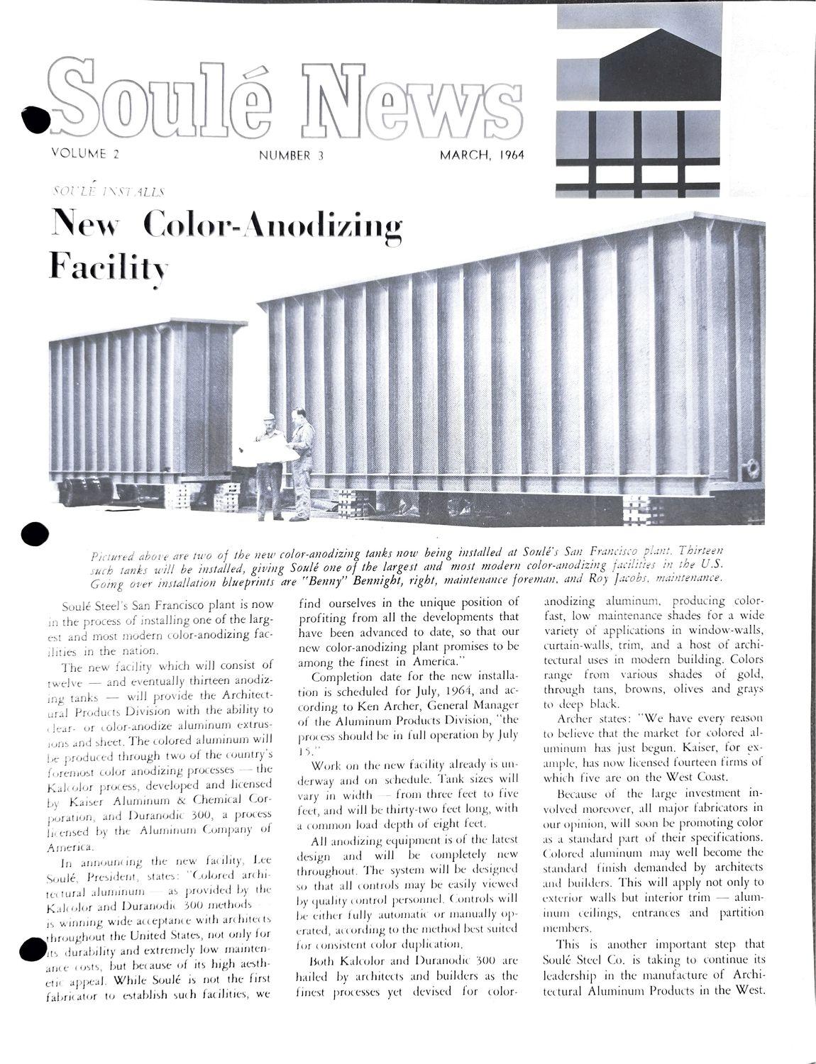 Large industrial anodizing facility building with a worker in white shirt.